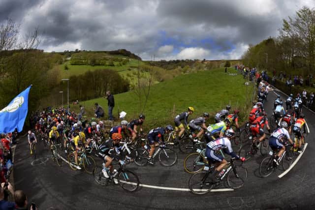 The peloton climbs up Scapegoat Hill out of Slaithwaite during the 2015 Tour de Yorkshire 
Picture Bruce Rollinson