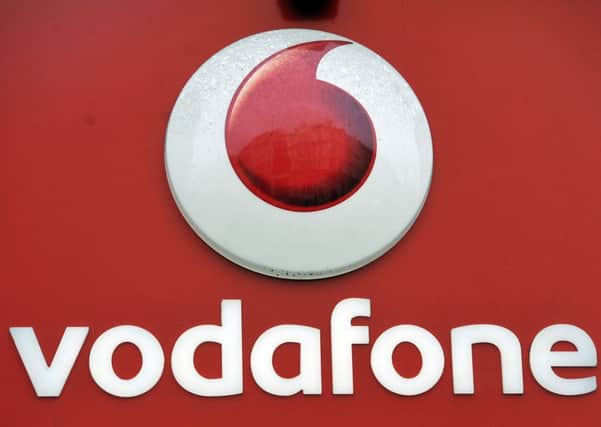 Vodafone has been slapped with a Â£4.6 million fine by Britain's telecom watchdog for breaching consumer protection rules.