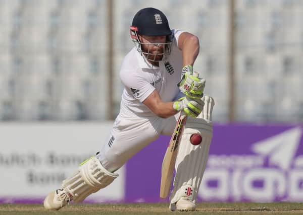 England's Jonny Bairstow plays a ball on the first day of their first cricket test match against Bangladesh in Chittagong. (AP Photo/A.M. Ahad)