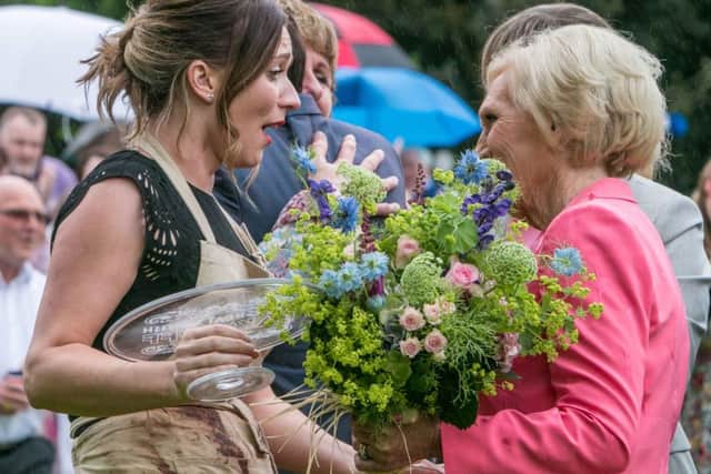 Mary Berry shaking hands with Candice Brown, who has been crowned champion of this year's Great British Bake Off.