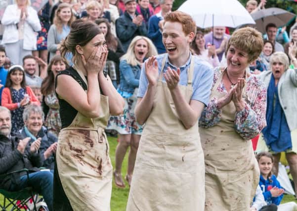 Jane Beedle (right), Andrew Smyth and Candice Brown, who has been crowned champion of this year's Great British Bake Off.