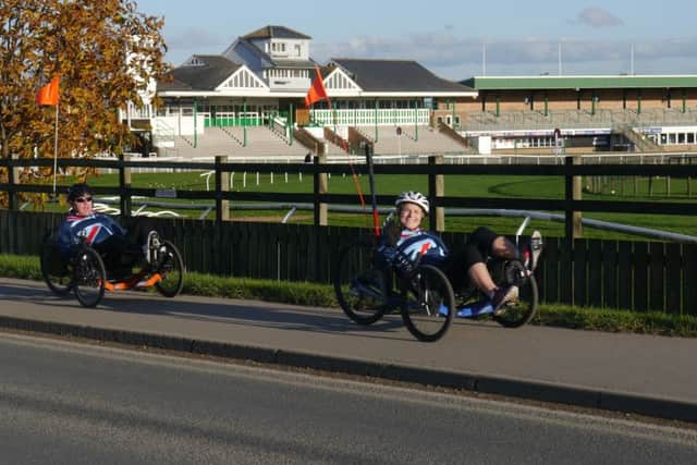 Anna Pollock training in her recumbent bike at Catterick Racecourse.