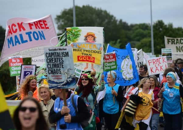 Protestors take part in a parade against fracking through the streets of Driffield.