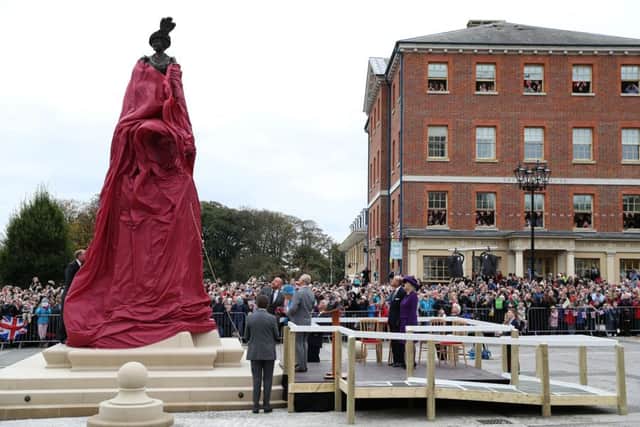 A statue of the Queen Mother is unveiled by the Queen and the Duke of Edinburgh with the Prince of Wales and the Duchess of Cornwall
