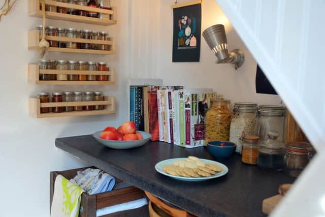 The kitchen is small but Sarah and Suzi have made the most of the space available with clever storage solutions