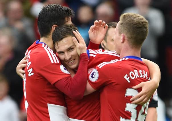 Middlesbrough's Stewart Downing celebrates scoring his sides second goal during the Premier League match at the Riverside (Pic PA)