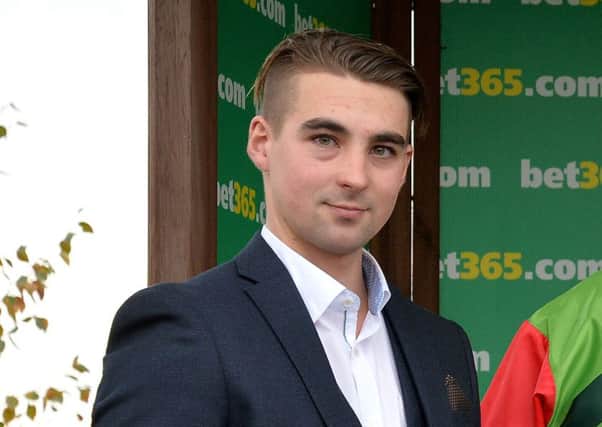 Jockey Joe Colliver receives his award for top conditional jockey at Wetherby 2015-16 season during day two of the bet365 Charlie Hall Meeting at Wetherby Racecourse. Photo:  Anna Gowthorpe/PA Wire