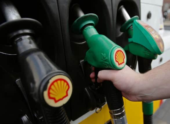 File photo of a Shell logo on a petrol pump at a petrol station Photo:  Yui Mok/PA Wire