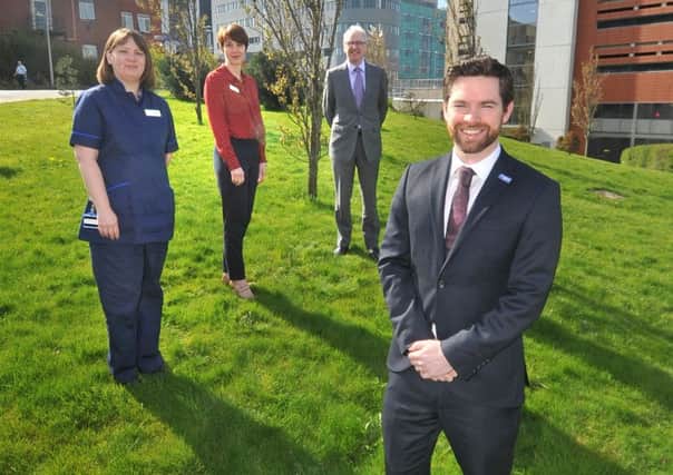 Ben Feely, fundraising manager at Maggie's, right,  at the site proposed to house the new Maggie's centre at St James's Hospital with Kate Smith, head nurse oncology clinical services unit, Karen Henry, lead cancer nurse at the Leeds Cancer Centre ad Sean Duffy, strategic clinical  head at the Leeds Cancer Centre.  Picture Tony Johnson