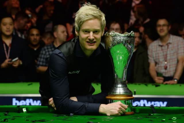 Neil Robertson celebrates winning the 2015 Betway UK Snooker Championship at the York Barbican.