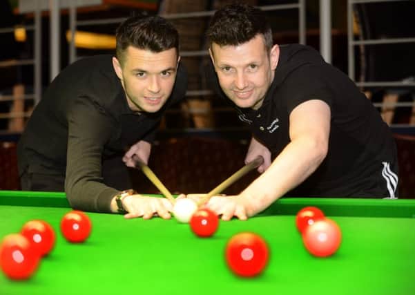 Father and son Peter Lines  (right) with Oliver Lines at the Northern Snooker centre in Leeds.