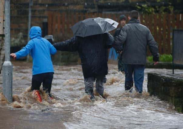 MPs want an overhaul of our flood defences. (picture: PA).