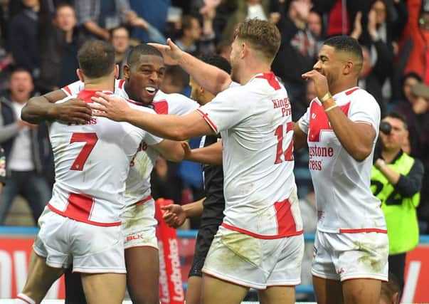 England's Jermaine McGillvary is congratulated on scoring against New Zealand on Saturday (Picture: Dave Howarth/PA Wire).