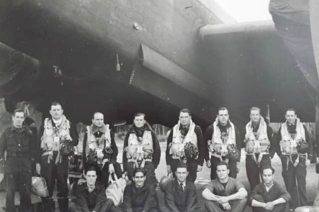 Halifax NA549 H7-M and crew  (L-R in flying suits): Pilot Capt. Alphonse Beraud (killed in action); Lt. Pierre Valletta (PoW); Lt. Pierre Raffin (killed in action); Adjutant Jean Cloarec (PoW); Sgt. P. Imart (PoW); Sgt/C J Bellon (PoW) Adj. Jacques Manfroy (PoW). Image also shows ground crew surrounding the aircrew.