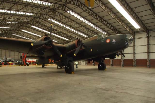 The unique restored Halifax bomber at the Yorkshire Air Museum with the starboard side painted in French markings with the distinctive "White Rabbit" logo of 345 "Guyenne" Squadron.