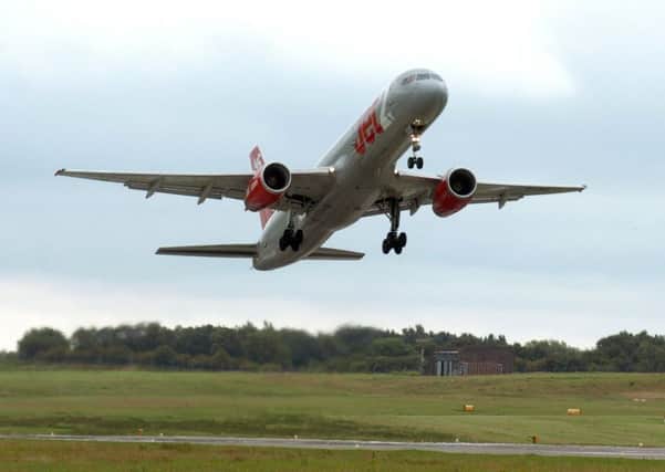 A plane takes off from Leeds Bradford Airport.