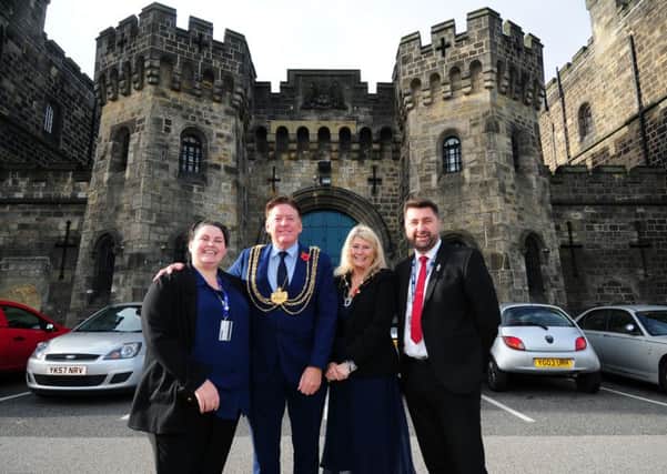Lord Mayor of Leeds Gerry Harper and Lady Mayoress Lynne Scholes Pictured with activities hub manager Kelly Franks and operational governor officer Justin Drake, during the visit to Leeds Prison, Leeds. ..Picture by Simon Hulme