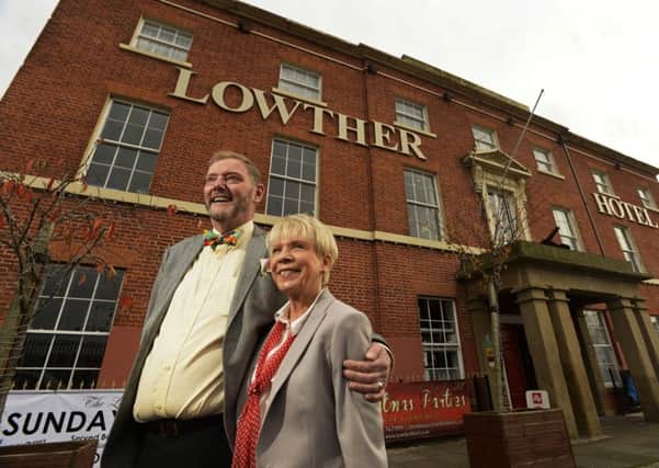 Howard and Julie Duckworth outside The Lowther Hotel, one of a numbr of buildings they have restored in Goole.