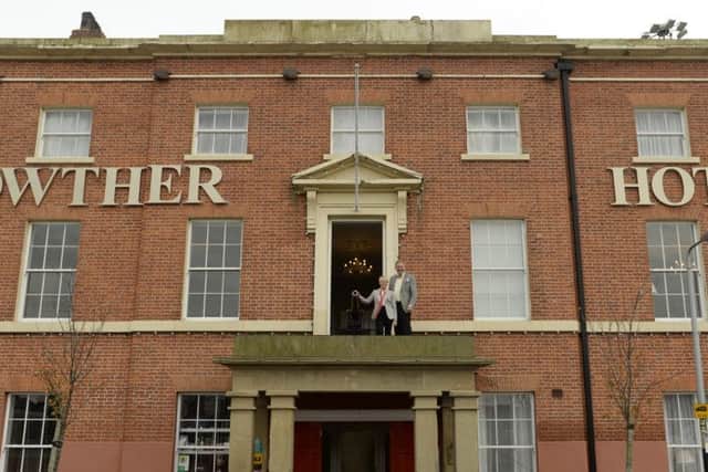 Julie and Howard Duckworth have replaced the iconic cannon on the front of The Lowther Hotel in Goole which was almost derelict when they took it over.  Picture bu Bruce Rollinson.