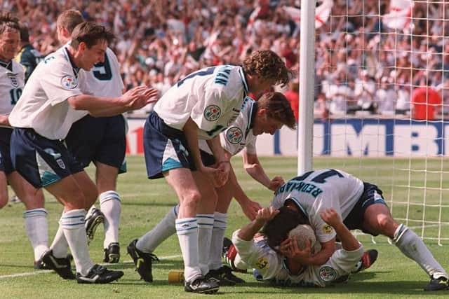 MAGIC MEMORIES: Paul Gascoigne celebrates after scoring tagainst Scotland in the group stages of Euro 1996 - a goal  voted the greatest-ever at Wembley. Picture: PA/Neil Munns
