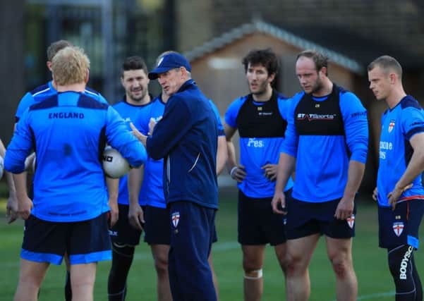 England coach Wayne Bennett with the squad in training (Photo: PA)