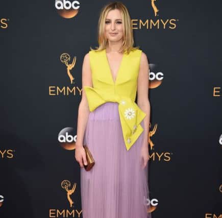 A chiffon shirt is a must for this winter (maybe not the weird yellow top, though) - Laura Carmichael at thePrimetime Emmy Awards in Los Angeles. (Photo by Jordan Strauss/Invision/AP)