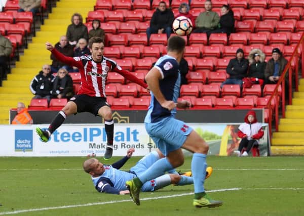 Sheffield United's Stefan Scougall scoring his team's second goal of the game against Leyton Orient. Picture: Simon Bellis/Sportimage.