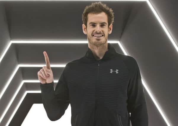 TOP DOG: Andy Murray holds up his finger to show he is No 1 in the world after winning the final of the Paris Masters. Picture: AP/Michel Euler
