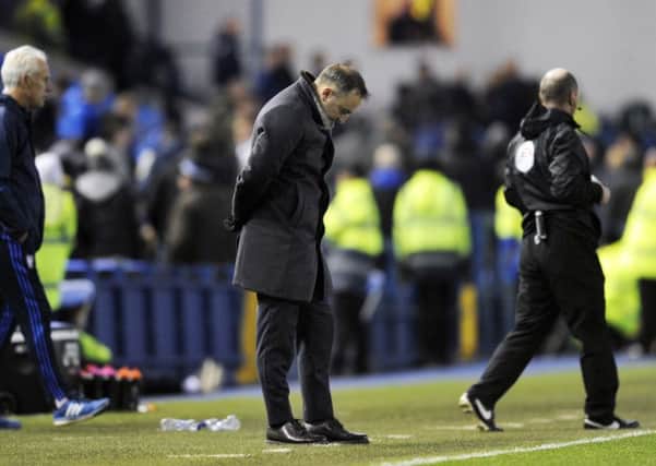 TOUGH TO SWALLOW: Owls boss Carlos Carvalhal shows his frustration at Hillsborough on Saturday. Picture: Steve Ellis