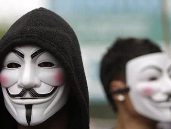 The attackers were wearing Guy Fawkes masks made famous by the Anonymous movement and the film V For Vendetta.