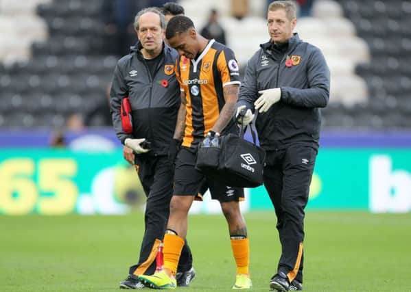 Hull City's Abel Hernandez (centre) leaves the pitch with an injury during the Premier League match at the KCOM Stadium, Hull. (Picture: PA)