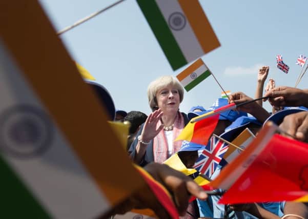 Theresa May flew to India this week for Brexit trade talks as her EU strategy was challenged by the judiciary.
