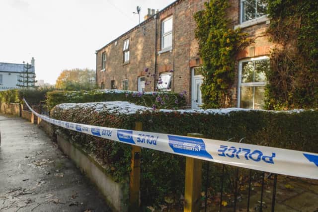 Seven homes have been evacuated after a large sinkhole opened up behind a row of houses in Ripon. Picture: Ross Parry Agency