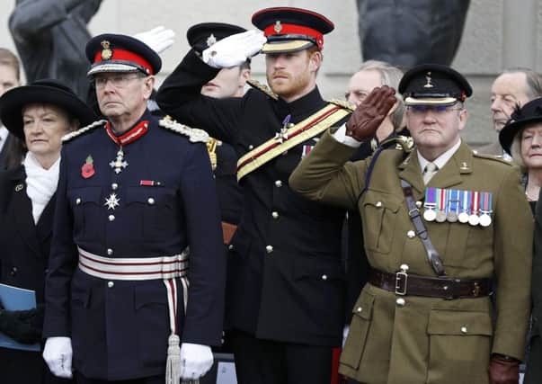 Prince Harry attending a Service of Remembrance at the Armed Forces Memorial at the National Memorial Arboretum in Staffordshire.
