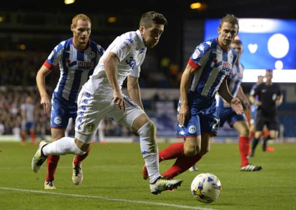 Pablo Hernandez bursts through against Wigan - a shot that typifies his approach to playing since joining Leeds.  Picture Bruce Rollinson