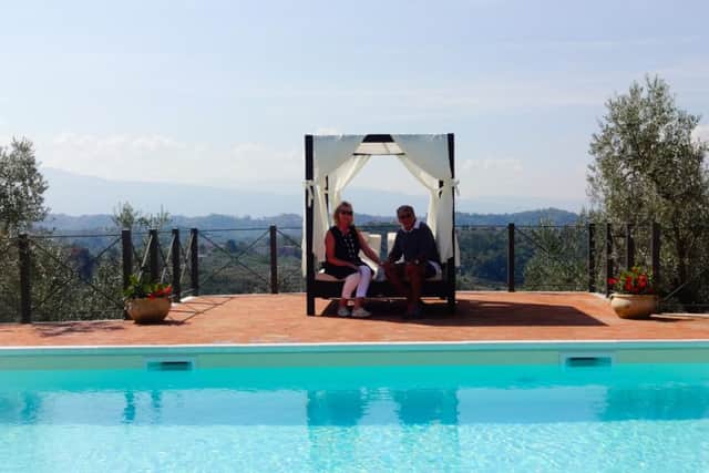 Alana and Joe Mazza beside the new pool at Casale San Pietro.