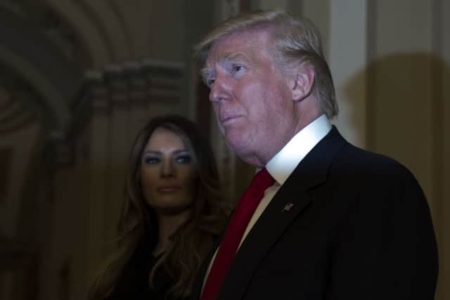 US president Donald Trump, pictured with his wife Melania in Washington.  Picture: AP Photo/Molly Riley.