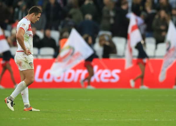 England captain Sam Burgess looks dejected after the final whistle against Australia. Picture: Nigel French/PA