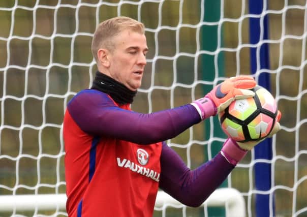 Joe Hart makes a save during training yesterday ahead of Englands friendly international with Spain at Wembley tonight (Picture: Adam Davy/PA Wire).