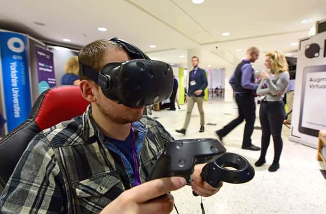 Michael Smith of New Moon Games wears his VR headset at Venturefest 2016, held at York Racecourse.
Picture: Anthony Chappel-Ross