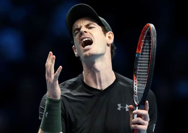 Andy Murray reacts during the tie-break in the first set during his match against Kei Nishikori.