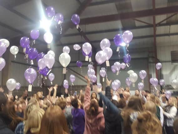 Hundreds released balloons at the vigil