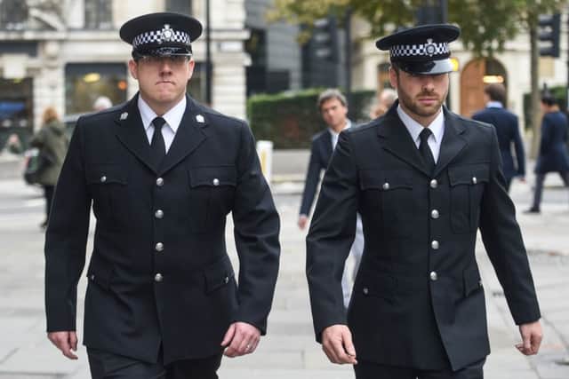 Pc Craig Nicholls (left) and Pc Jonathan Wright outside the murder trial at the Old Bailey. Picture: SWNS