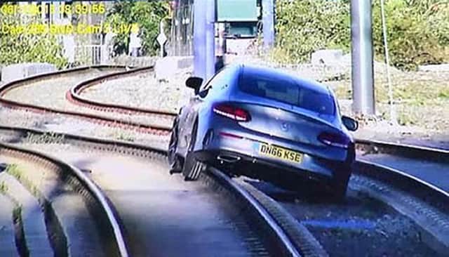 Maurice Cooney, 33, from Telford, Shropshire, admitted drink-driving after getting his new Mercedes stuck on Birmingham's tramlines