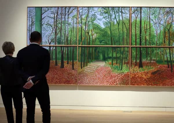 David Hockney's "Woldgate Woods, 24, 25 and 26 October, 2006" is displayed at Sotheby's, in New York.