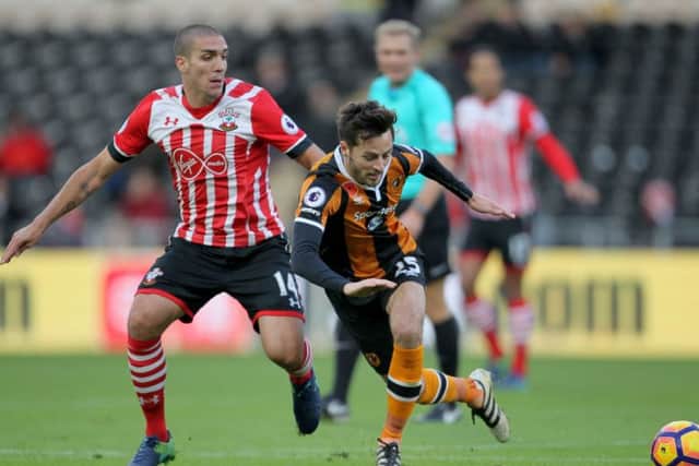 Spurred on: Hull Citys Ryan Mason, right, battling with Southamptons Oriol Romeu