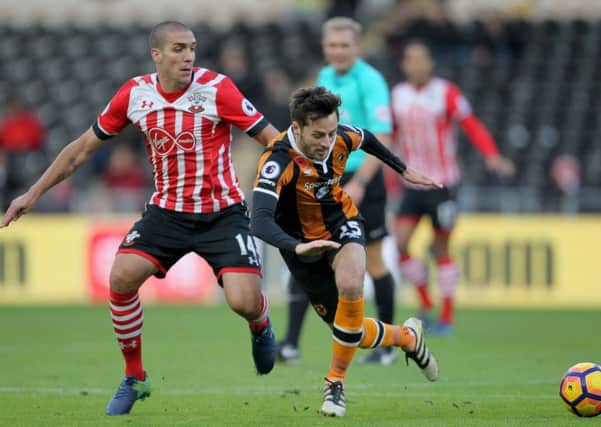 Spurred on: Hull Citys Ryan Mason, right, battling with Southamptons Oriol Romeu
