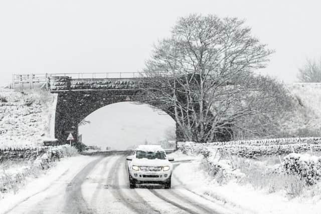 The scene between Ingleton and Hawes in the Yorkshire Dales National Park after winter weather brought snow to high ground