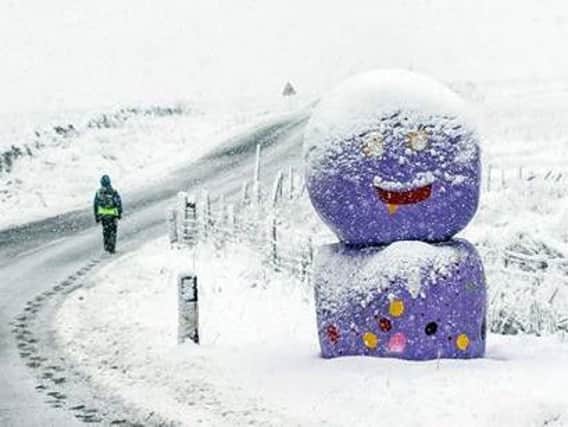 The purple snowman. Photo: PA
