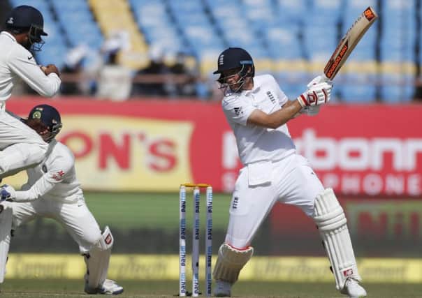 MAJESTIC: England's Joe Root on his way to a century during the first Test in Rajkot. Picture: AP/Rafiq Maqbool)
